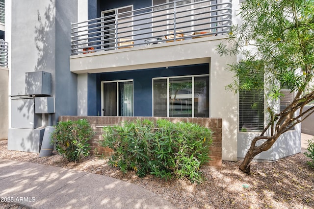 3633 N 3rd Ave Unit 1035, Phoenix, AZ 85013 - property entrance with a balcony and stucco siding