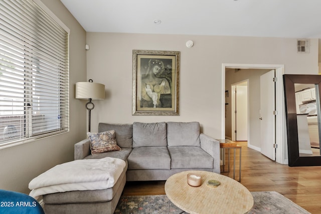 3633 N 3rd Ave Unit 1035, Phoenix, AZ 85013 - living room with wood finished floors and baseboards