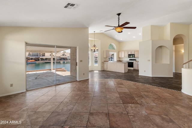 unfurnished living room with high vaulted ceiling and ceiling fan