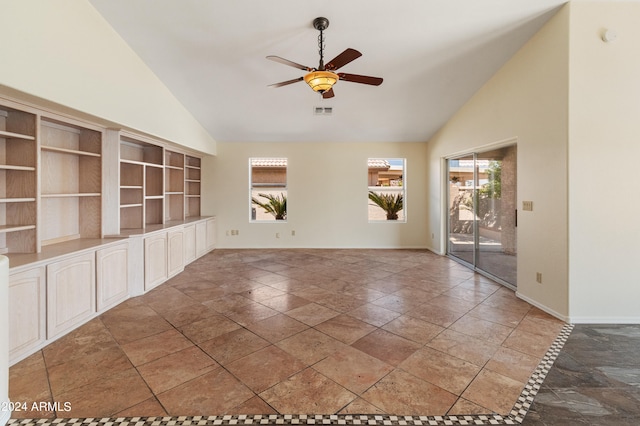 unfurnished room with high vaulted ceiling and ceiling fan