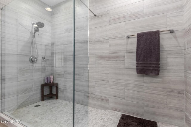 full bathroom featuring a shower stall