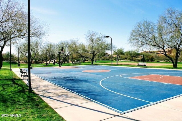 view of sport court with volleyball court, a lawn, and community basketball court