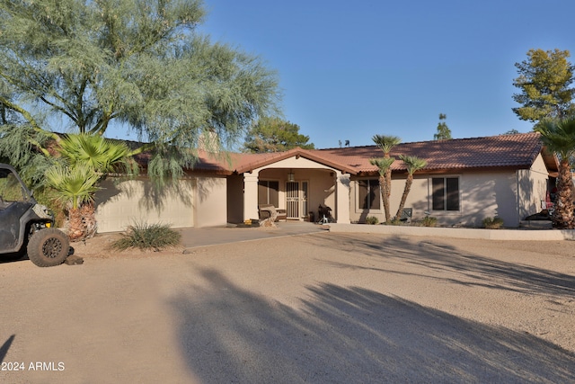 view of front of property with a garage