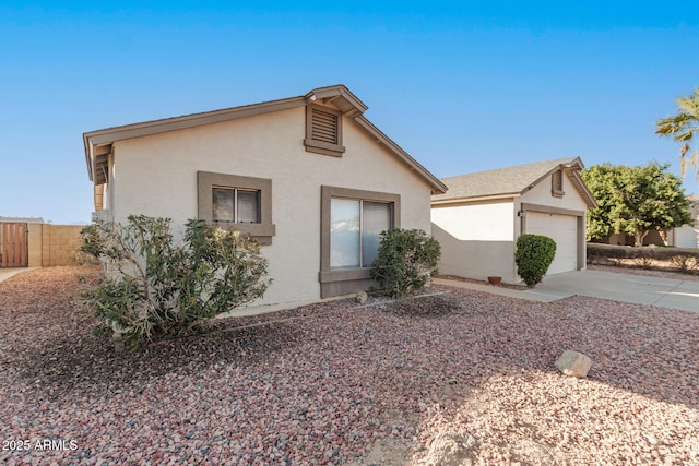 single story home featuring a garage