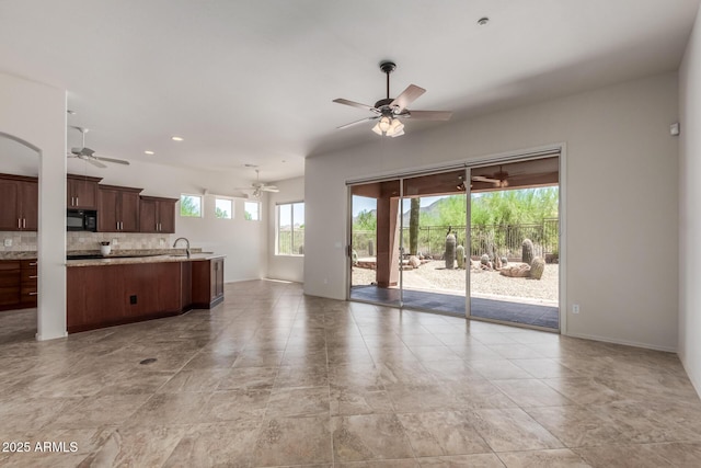 14657 N 103rd Way, Scottsdale, AZ 85255 - unfurnished living room with ceiling fan and recessed lighting