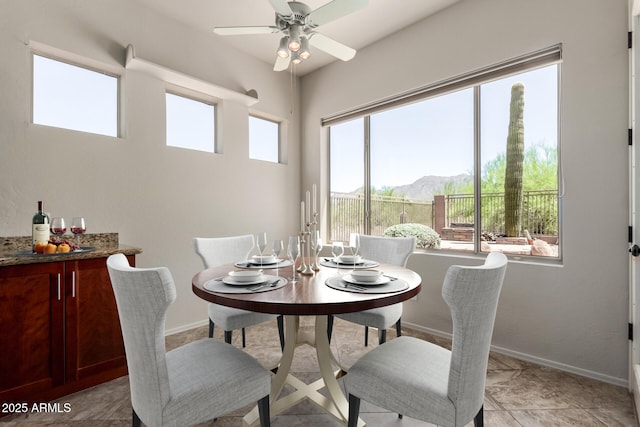 14657 N 103rd Way, Scottsdale, AZ 85255 - dining area with ceiling fan and baseboards