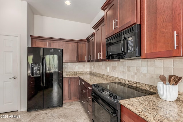 14657 N 103rd Way, Scottsdale, AZ 85255 - kitchen featuring black appliances, light stone counters, and decorative backsplash