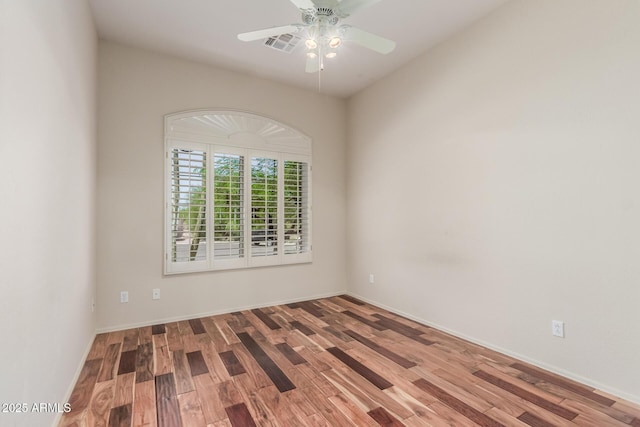 14657 N 103rd Way, Scottsdale, AZ 85255 - empty room with wood finished floors and ceiling fan