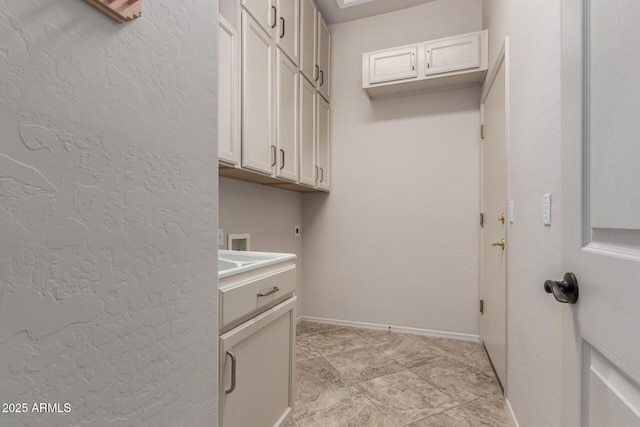 14657 N 103rd Way, Scottsdale, AZ 85255 - washroom featuring cabinet space, electric dryer hookup, and hookup for a washing machine