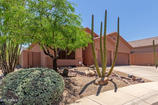 14657 N 103rd Way, Scottsdale, AZ 85255 - view of yard with concrete driveway and a garage