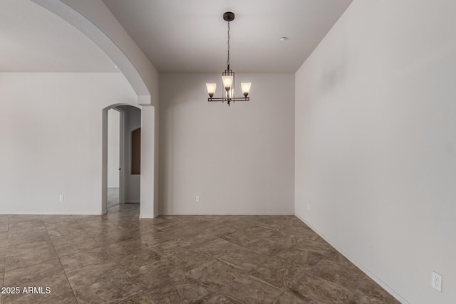 14657 N 103rd Way, Scottsdale, AZ 85255 - spare room with arched walkways and a chandelier