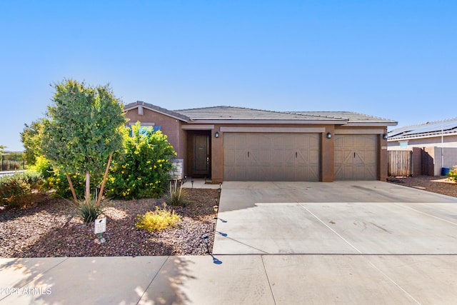 view of front of home featuring a garage