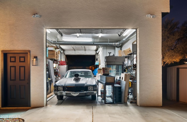 garage featuring a textured wall