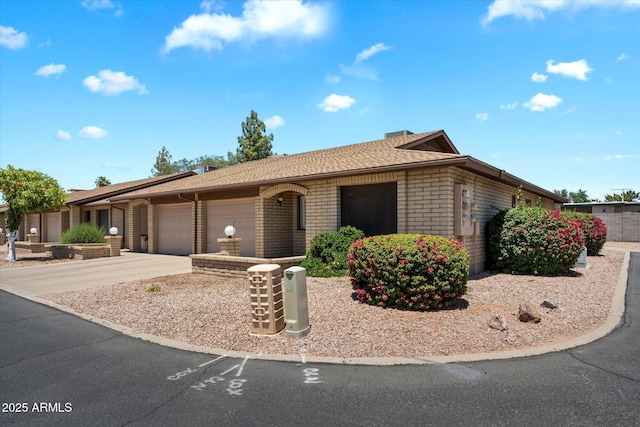520 S Greenfield Rd Unit 7, Mesa, AZ 85206 - ranch-style house with brick siding and an attached garage