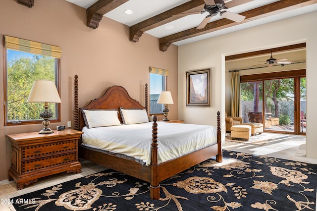 bedroom featuring beam ceiling, multiple windows, ceiling fan, and access to exterior