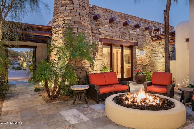 view of patio / terrace with a fire pit