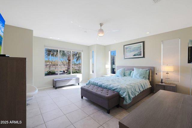 bedroom with light tile patterned floors and ceiling fan