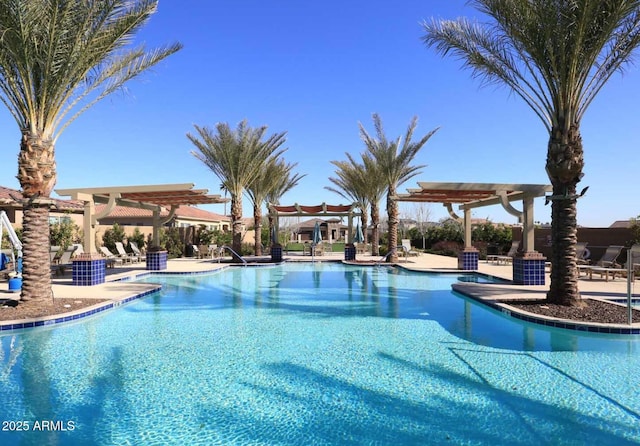 view of swimming pool featuring a pergola