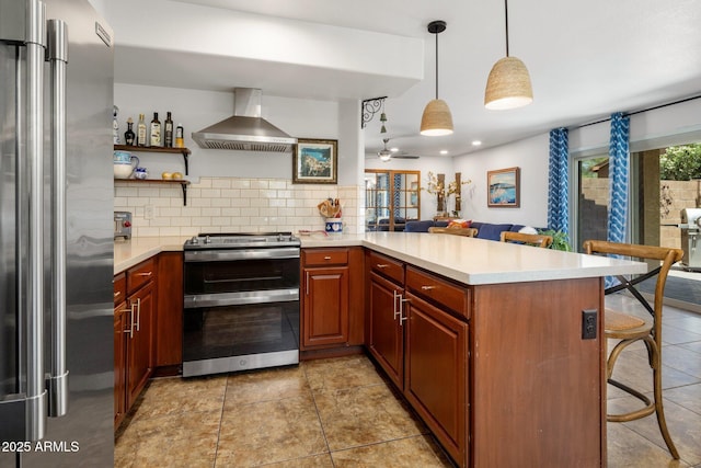 21813 N 40th Way, Phoenix, AZ 85050 - kitchen featuring appliances with stainless steel finishes, wall chimney range hood, a peninsula, tasteful backsplash, and light countertops