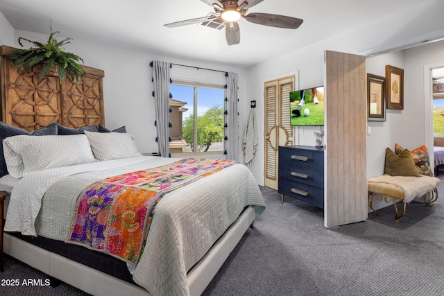 21813 N 40th Way, Phoenix, AZ 85050 - bedroom with dark carpet, access to outside, and a ceiling fan