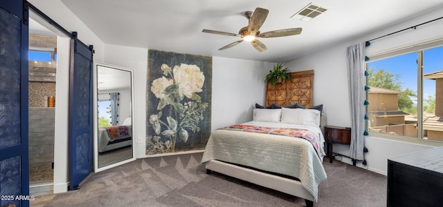 21813 N 40th Way, Phoenix, AZ 85050 - bedroom with carpet flooring, a barn door, and ceiling fan