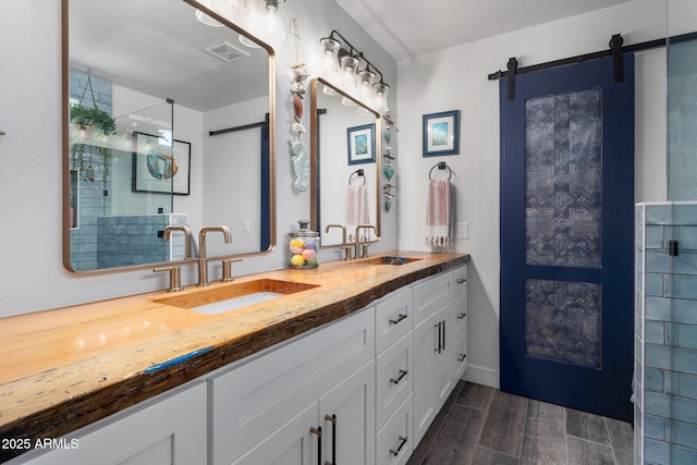 21813 N 40th Way, Phoenix, AZ 85050 - full bathroom featuring double vanity, wood finished floors, and a stall shower