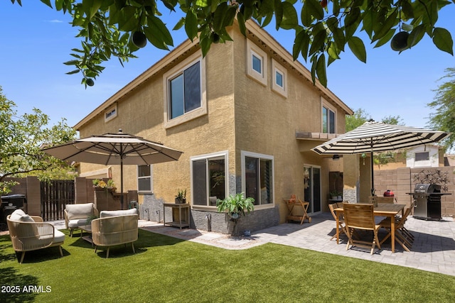 21813 N 40th Way, Phoenix, AZ 85050 - rear view of house featuring stucco siding, a patio area, and stone siding