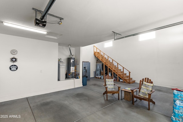 garage with a garage door opener, gas water heater, and stainless steel fridge with ice dispenser