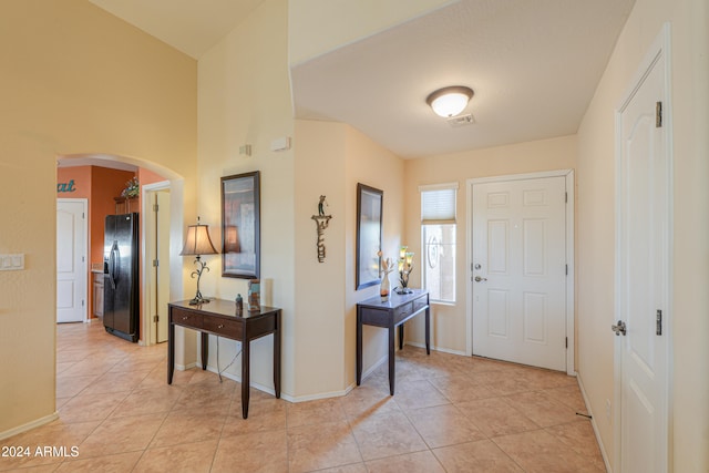 view of tiled foyer entrance