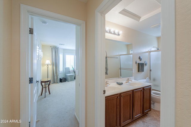 bathroom with vanity, toilet, and walk in shower