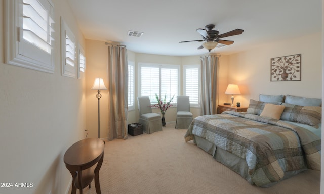 bedroom featuring ceiling fan and carpet floors