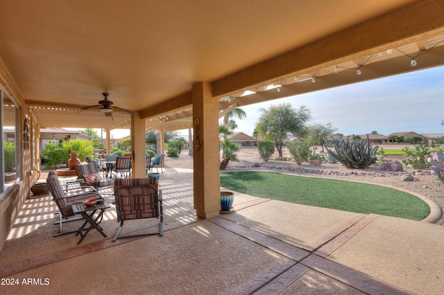 view of patio / terrace featuring ceiling fan