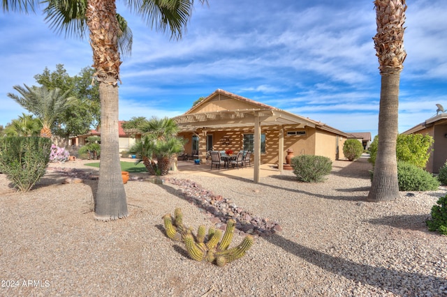 back of property with a patio area