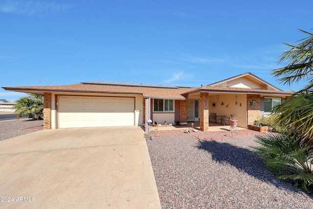 single story home with a garage