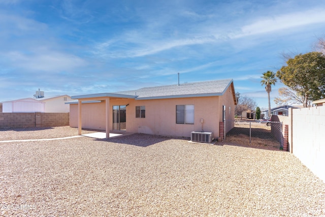 back of property featuring central AC unit and a patio area