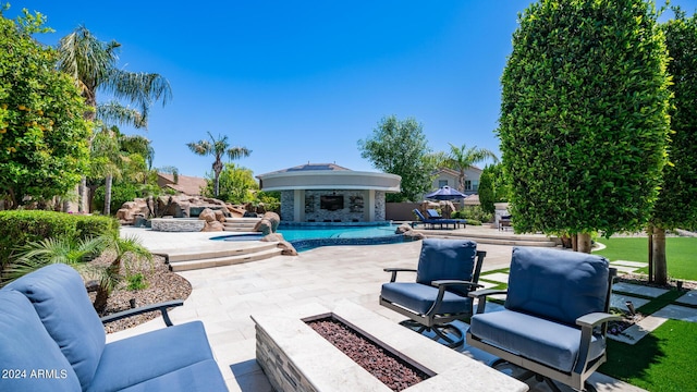 view of patio / terrace with an outdoor pool