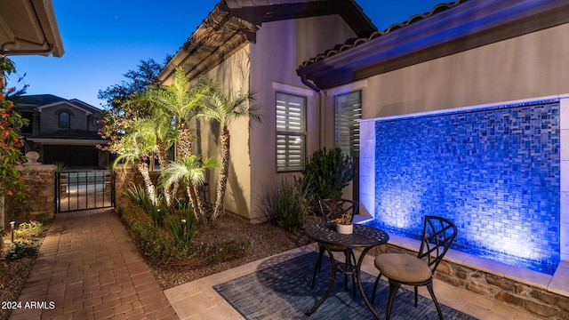 view of patio / terrace featuring a gate