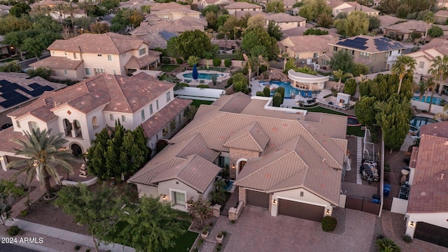 birds eye view of property with a residential view