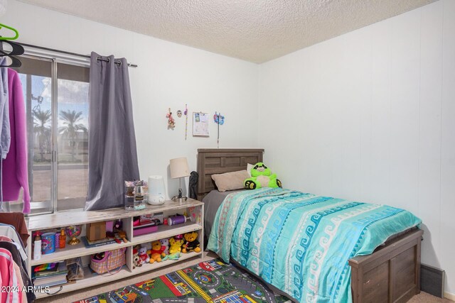 bedroom with a textured ceiling