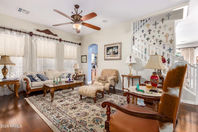 sitting room featuring dark hardwood / wood-style floors, plenty of natural light, and ceiling fan