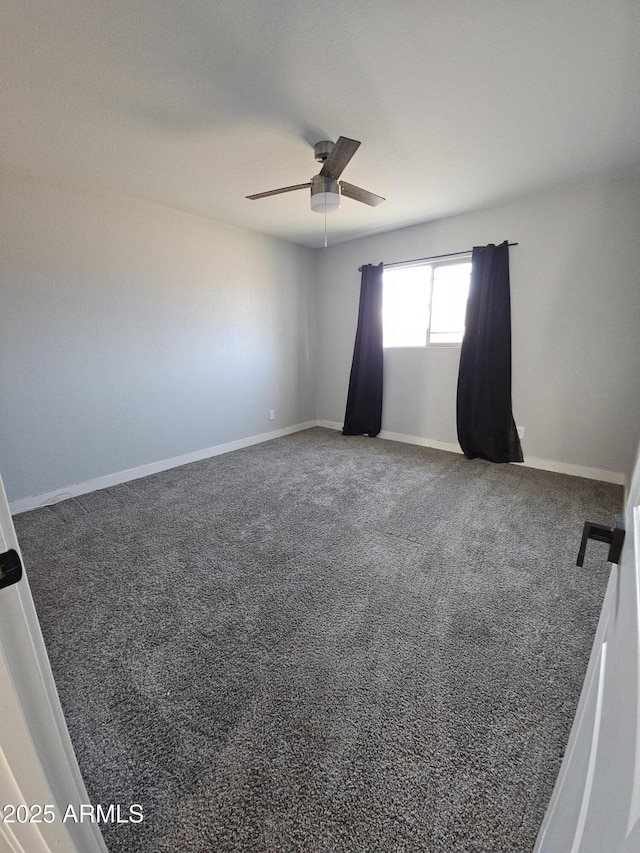 unfurnished room with ceiling fan and carpet flooring