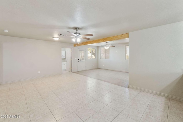 13245 N Betty Angel Way, Florence, AZ 85132 - empty room featuring ceiling fan, baseboards, light tile patterned floors, a textured ceiling, and a smoke detector