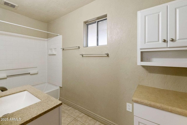 13245 N Betty Angel Way, Florence, AZ 85132 - full bath featuring baseboards, tile patterned flooring, vanity, and shower / tub combination