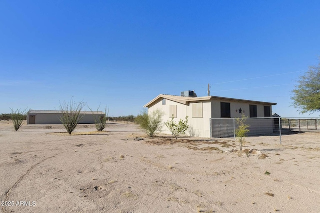 13245 N Betty Angel Way, Florence, AZ 85132 - rear view of property featuring fence