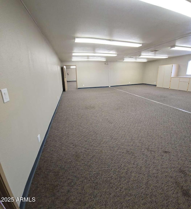 13245 N Betty Angel Way, Florence, AZ 85132 - carpeted empty room with baseboards