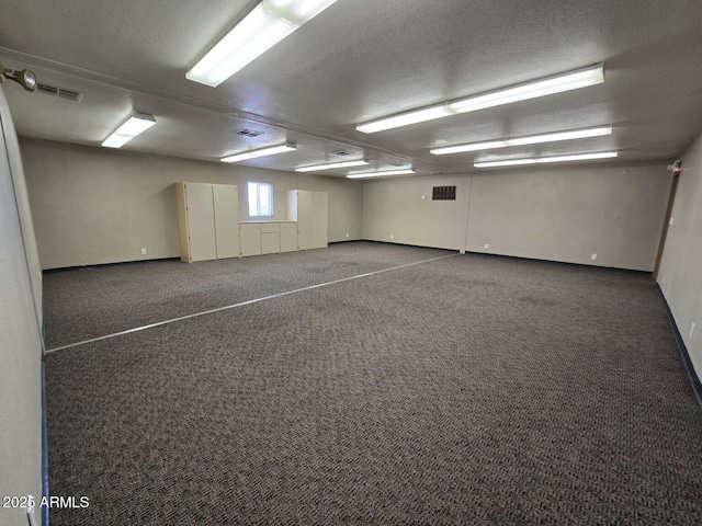 13245 N Betty Angel Way, Florence, AZ 85132 - carpeted spare room featuring a textured ceiling and baseboards