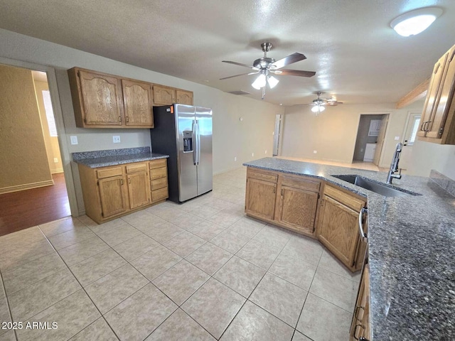 13245 N Betty Angel Way, Florence, AZ 85132 - kitchen featuring stainless steel fridge with ice dispenser, a sink, ceiling fan, and light tile patterned floors