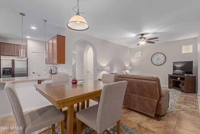 dining space with ceiling fan