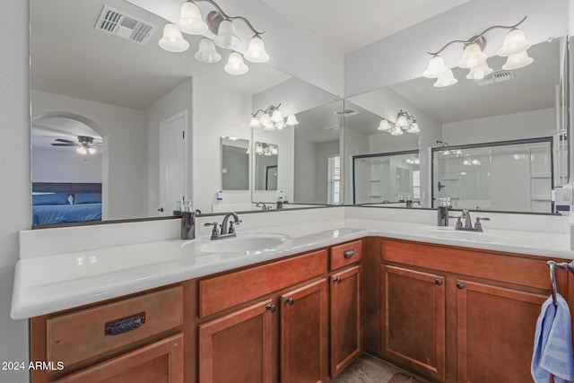 955 S Henry Ln, Gilbert, AZ 85296 - ensuite bathroom with a chandelier, a shower stall, ceiling fan, and double vanity