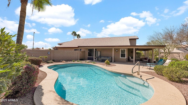 view of pool featuring a patio area, a fenced in pool, a fenced backyard, and ceiling fan